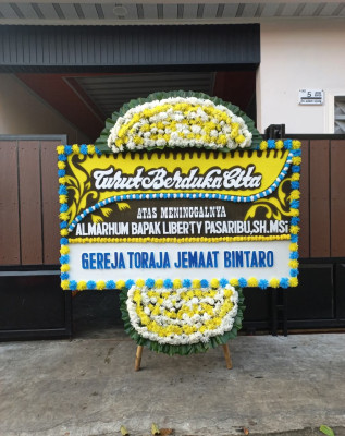 Papan Bunga Duka di Piloliyanga